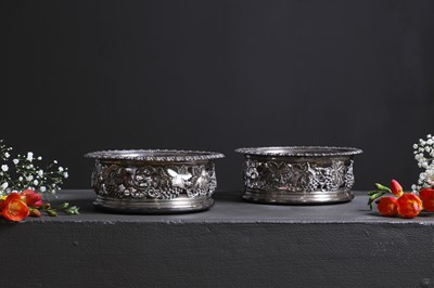 Lot 441 - A pair of George IV silver coasters