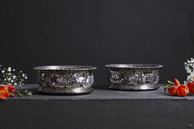 Lot 441 - A pair of George IV silver coasters
