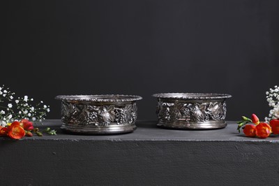 Lot 441 - A pair of George IV silver coasters
