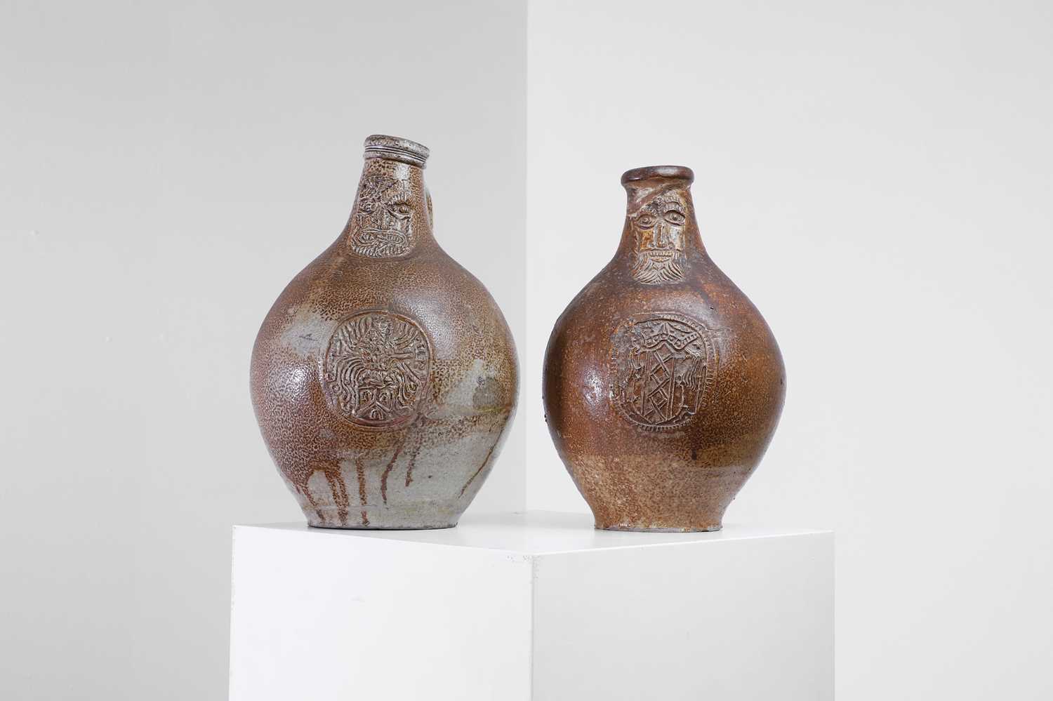Lot 323 - Two large salt-glazed bellarmine jugs