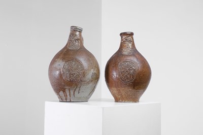 Lot 323 - Two large salt-glazed bellarmine jugs