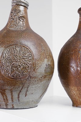 Lot 323 - Two large salt-glazed bellarmine jugs