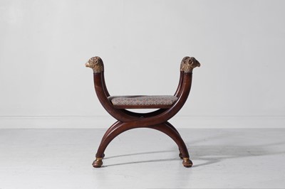 Lot 305 - A Regency-style mahogany 'X'-framed stool