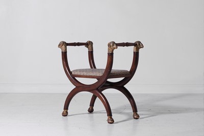 Lot 305 - A Regency-style mahogany 'X'-framed stool