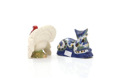 Lot 53 - A faience pottery cat