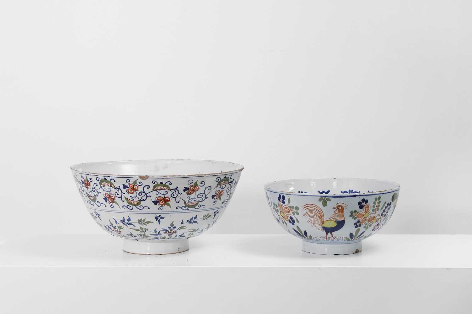 Lot 299 - Two delftware punchbowls