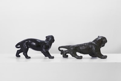 Lot 355 - Two bronze lionesses