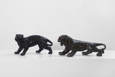 Lot 355 - Two bronze lionesses