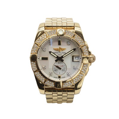 Lot 293 - An 18ct gold diamond set Breitling Galactic automatic bracelet watch, c.2013