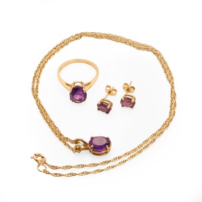 Lot 218 - A 9ct gold amethyst jewellery pendant, ring and earrings set