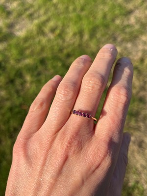 Lot 93 - A 9ct gold ruby five stone ring