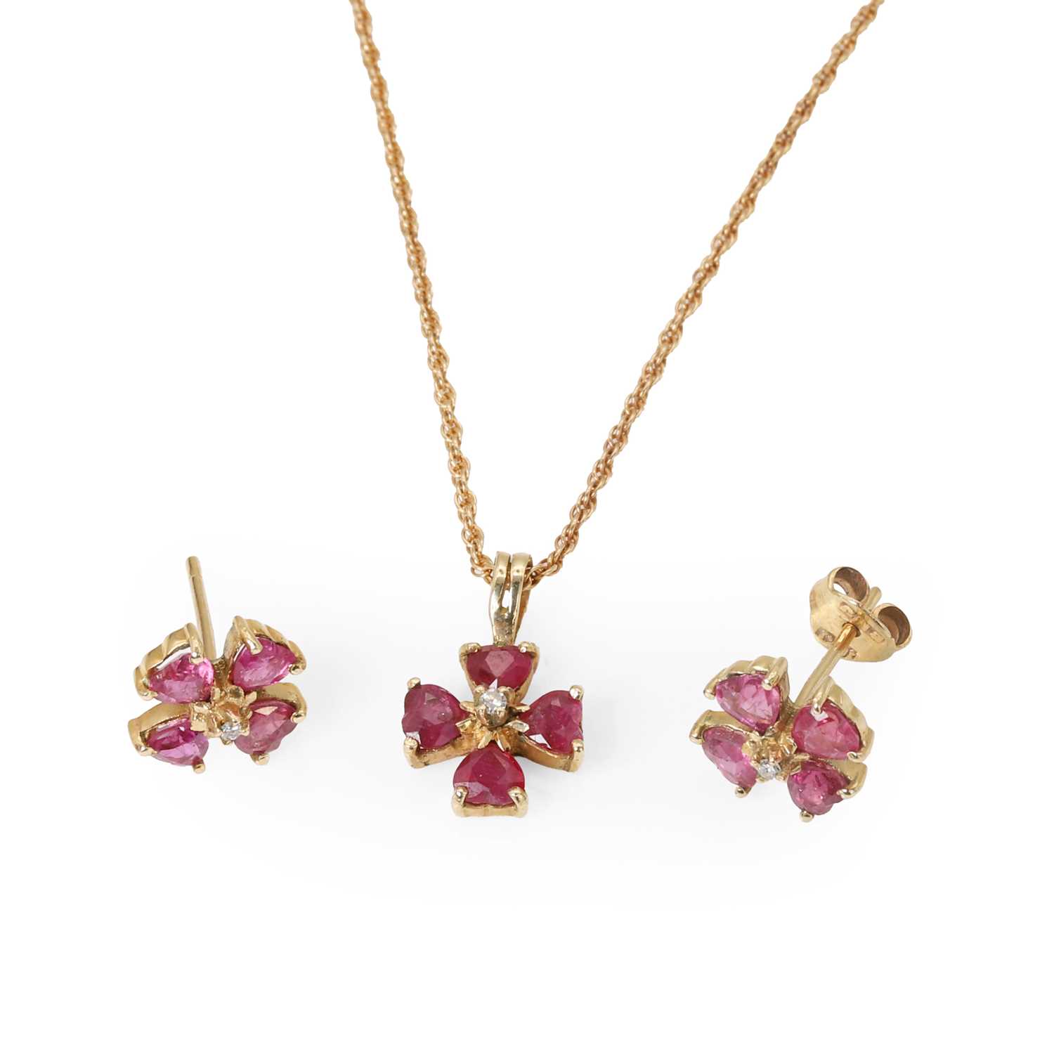 Lot 97 - A ruby and diamond floral pendant and earrings set