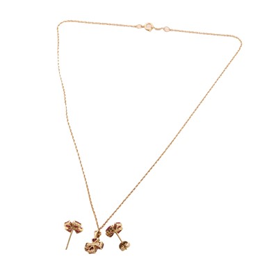 Lot 97 - A ruby and diamond floral pendant and earrings set