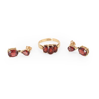 Lot 209 - A 9ct gold garnet ring and earring set