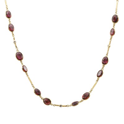 Lot 196 - An 18ct gold, garnet and diamond necklace