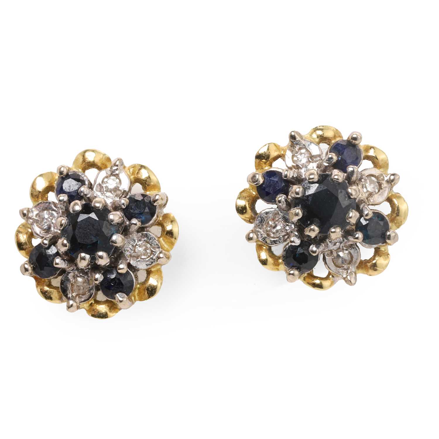 Lot 77 - A pair of 18ct gold sapphire and diamond cluster earrings