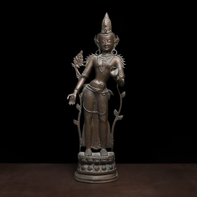 Lot 238 - A South East Asian bronzed brass figure of Bodhisattva Padmapani