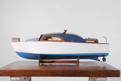 Lot 194 - A painted wooden model speedboat
