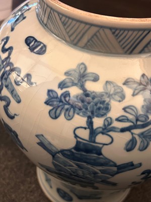 Lot 60 - A pair of Chinese blue and white vases and covers
