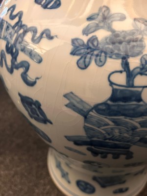 Lot 60 - A pair of Chinese blue and white vases and covers