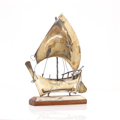 Lot 6 - A silver presentation trophy shaped as a boat