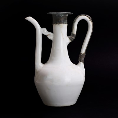 Lot 22 - A Chinese white-glazed ewer