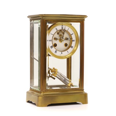 Lot 203 - A brass mantel clock