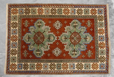 Lot 426 - A Kazak wool rug