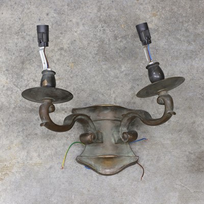 Lot 479 - A patinated bronze two branch wall light