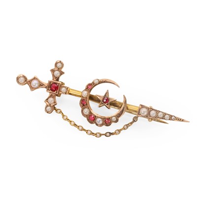 Lot 14 - A Victorian split pearl and ruby brooch