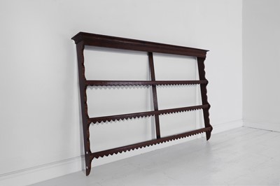Lot 63 - A George III oak and mahogany-banded plate rack