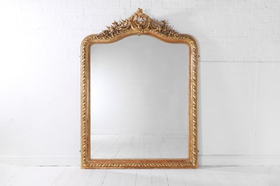 Lot 175 - A Louis XV-style carved giltwood and gesso overmantel mirror