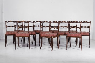 Lot 75 - A set of twelve simulated-rosewood dining chairs