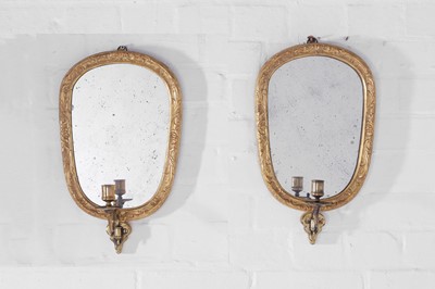 Lot 498 - A pair of George I-style gilt gesso girandoles