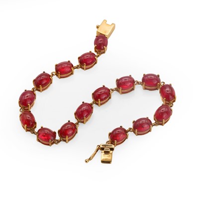 Lot 99 - A 9ct gold ruby line bracelet