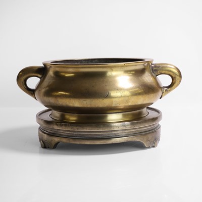 Lot 133 - A Chinese bronze incense burner and stand