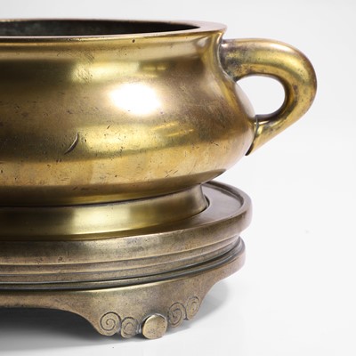 Lot 133 - A Chinese bronze incense burner and stand