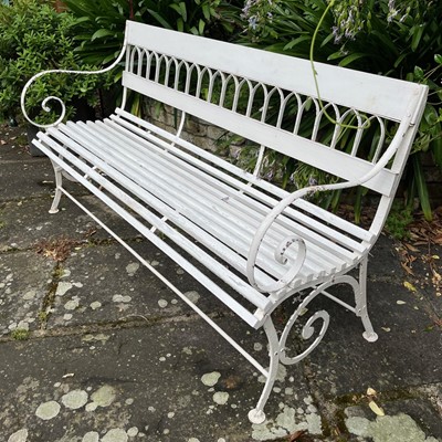 Lot 551 - A cast-iron and painted wooden bench