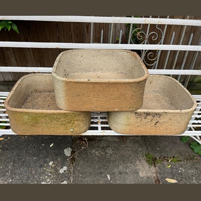 Lot 552 - A group of three fireclay planters