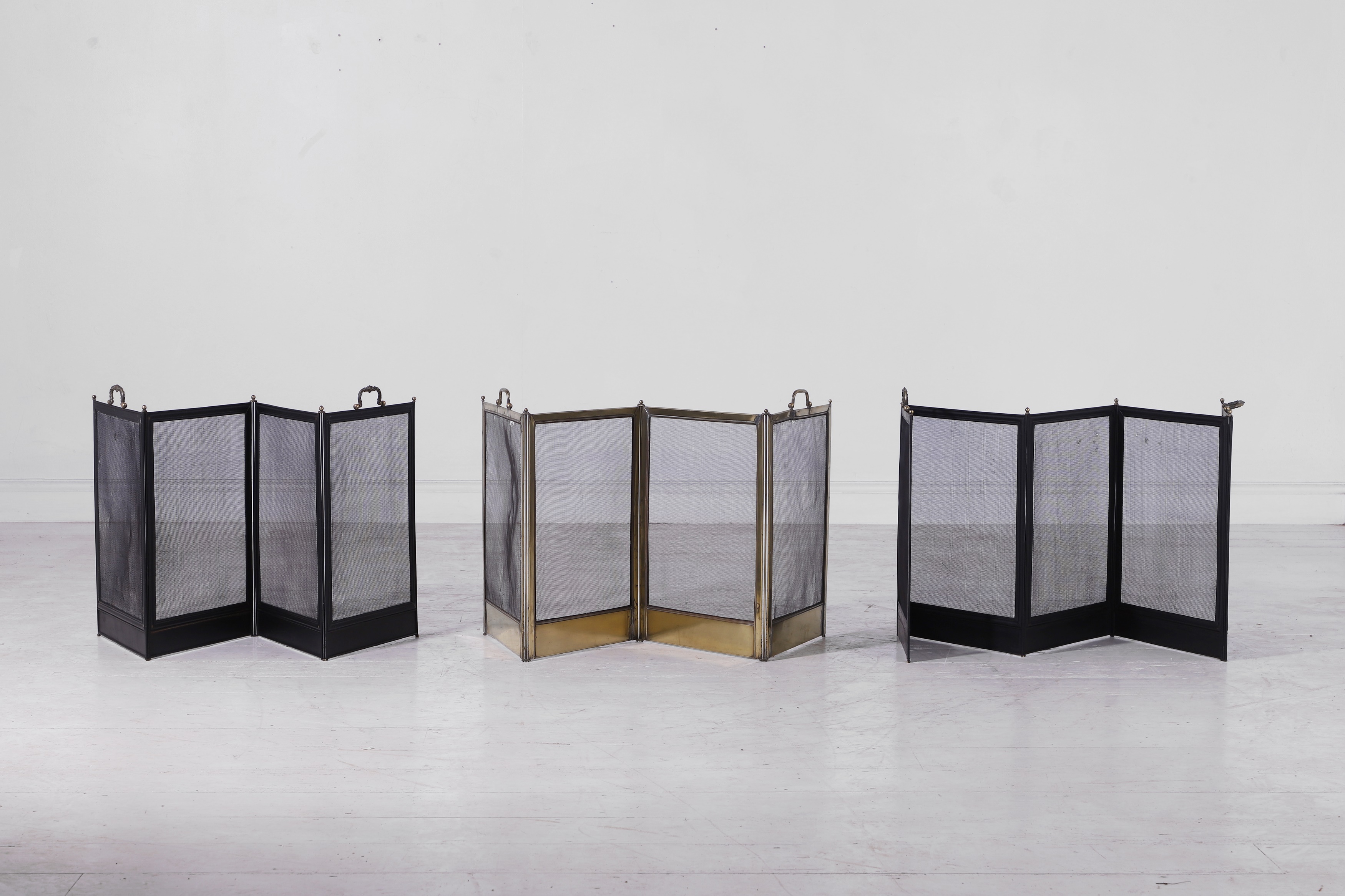 Lot 215 - Three folding fire screens,