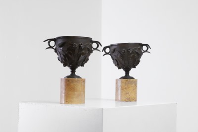 Lot 111 - A pair of bronze urns