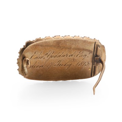 Lot 4 - A Georgian split pearl and garnet brooch