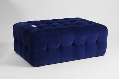 Lot 536 - A contemporary blue upholstered ottoman