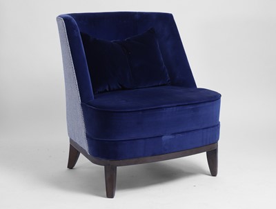 Lot 537 - A contemporary blue velvet armchair