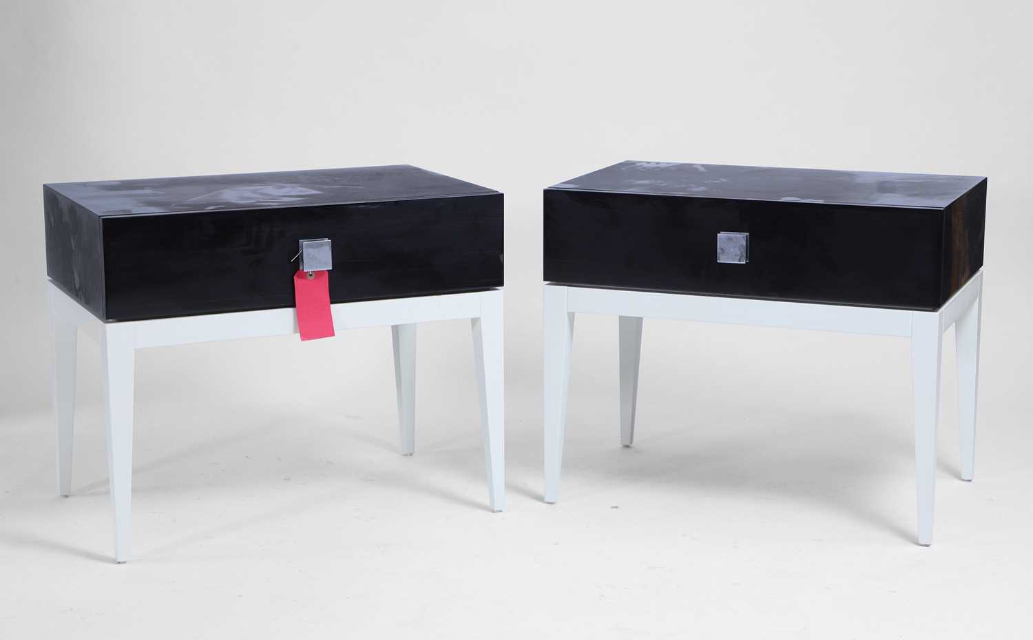 Lot 525 - A pair of contemporary bedside tables and a matching side table
