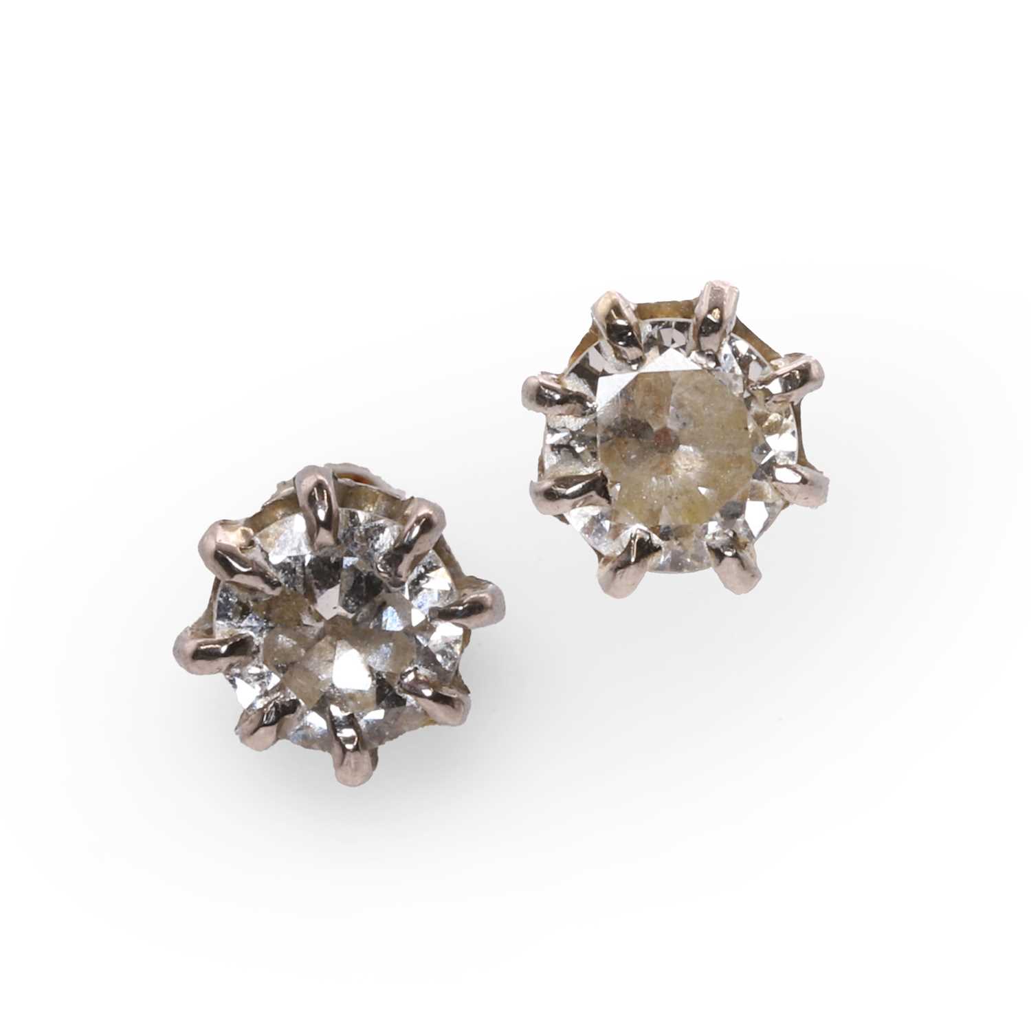 Lot 69 - A pair of diamond stud earrings