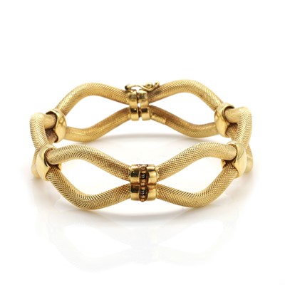 Lot 154 - An 18ct gold hinged bangle, by Unoaerre