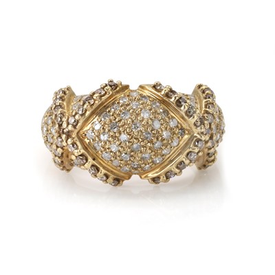 Lot 1073 - A 9ct gold diamond cluster bombé ring