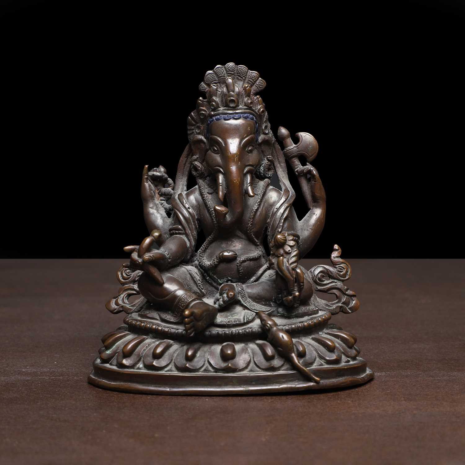 Lot 147 - A Tibetan bronze Ganesh