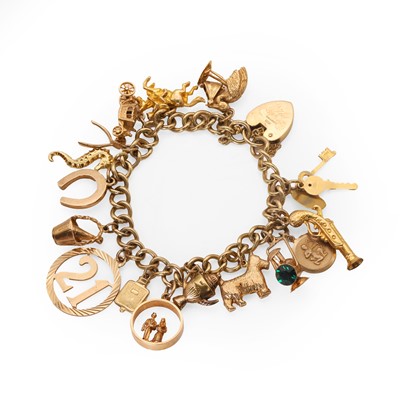 Lot 312 - A 9ct gold charm bracelet